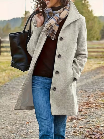 Mid-length single-breasted lapel coat in light gray, front view