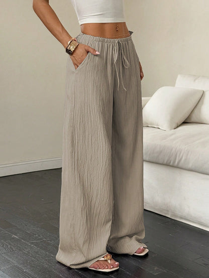 Drawstring wide-leg pants with a textured finish in taupe, front view