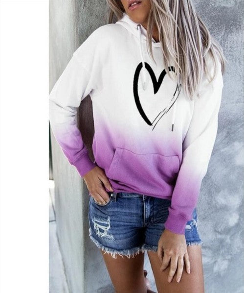 White hoodie with a black heart print and purple gradient hem