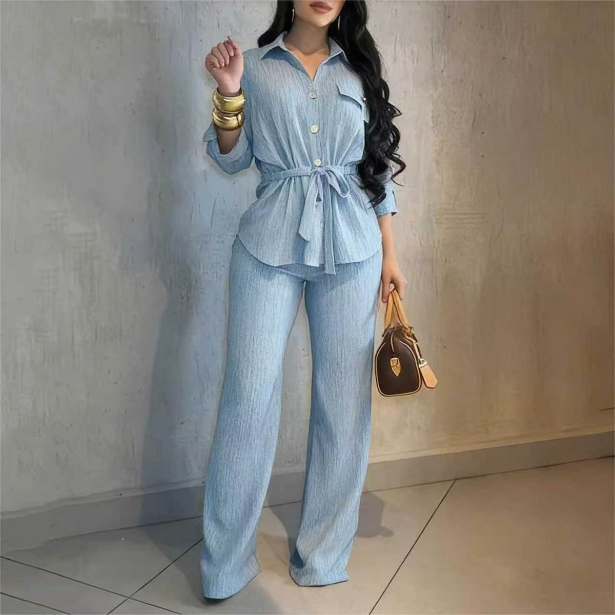 Lapel collar belted shirt and wide-leg pants set in light blue, front view