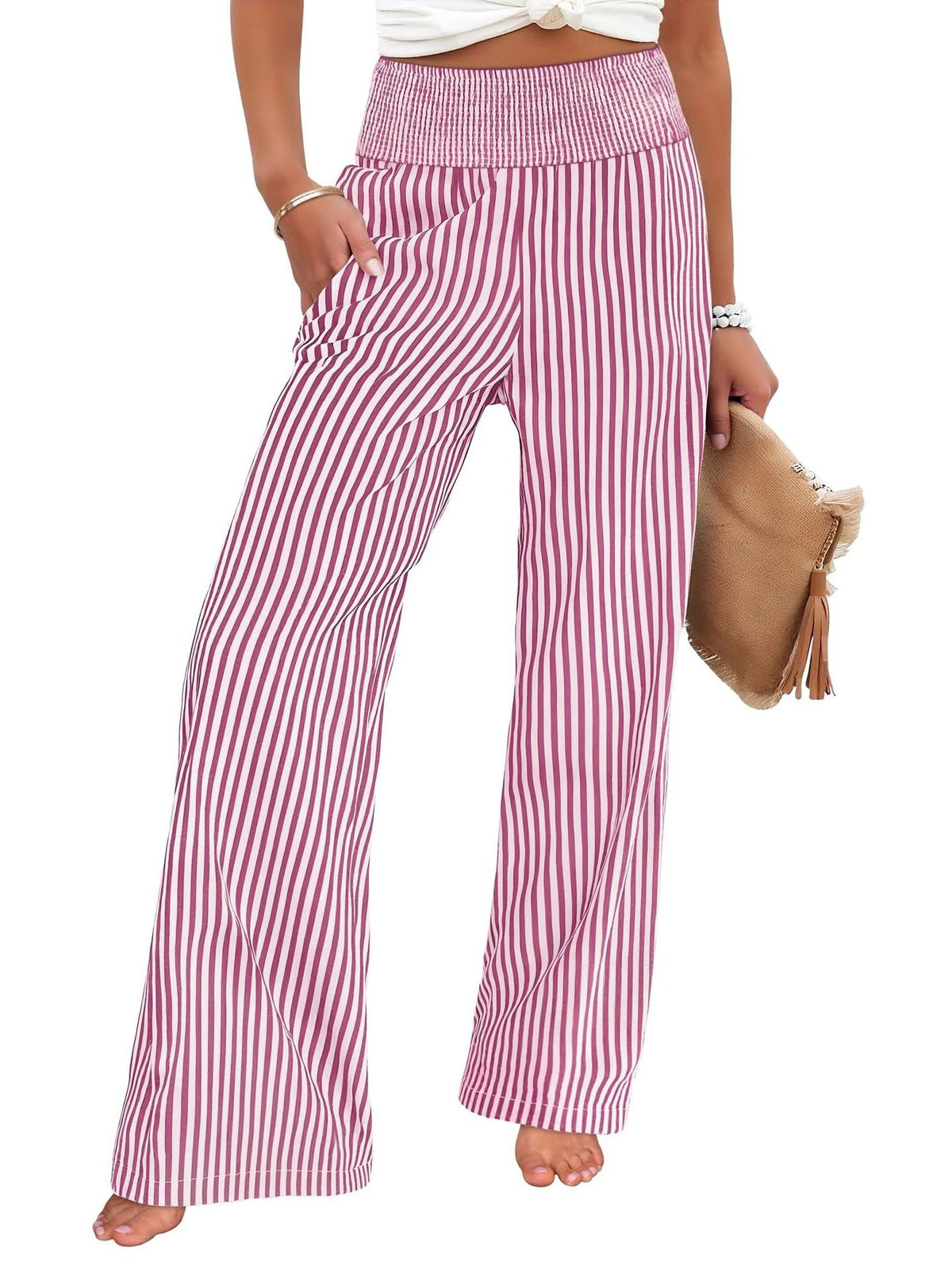 Wide-leg pants in raspberry and white stripe with a smocked high waist, front view