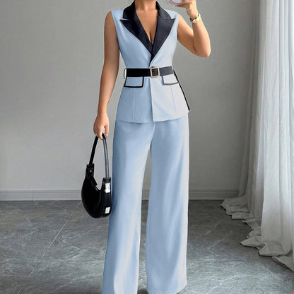 Light blue sleeveless belted blazer top with black lapel and matching wide-leg pants