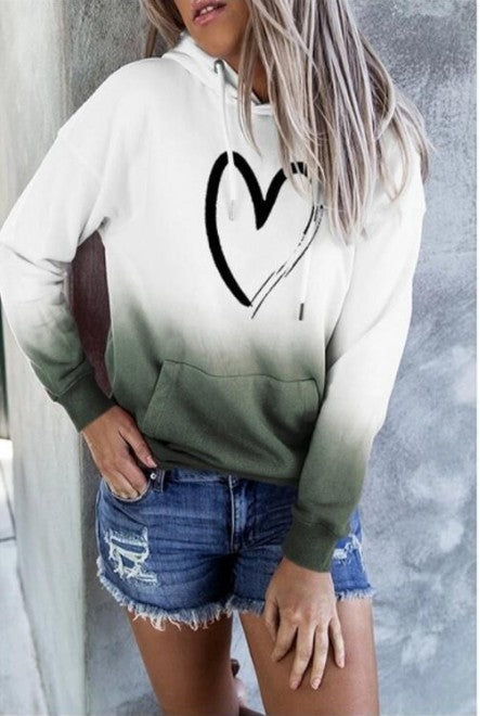 White hoodie with a black heart print and olive green gradient hem