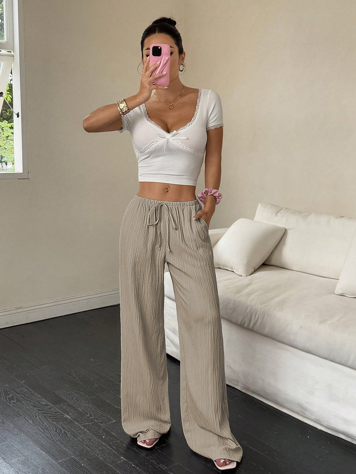 Drawstring wide-leg pants with a textured finish in taupe, front view