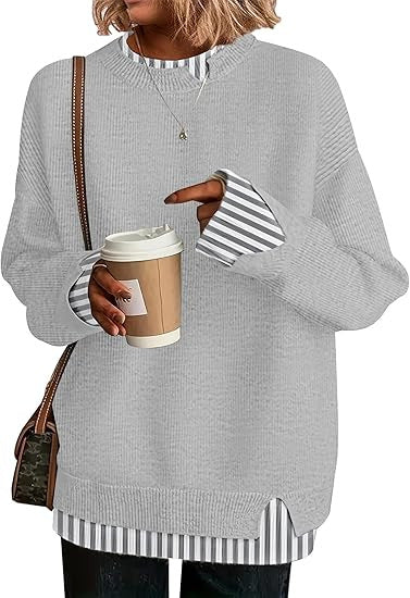Double-layer crewneck sweater in light gray with striped layered cuffs and hem, front view