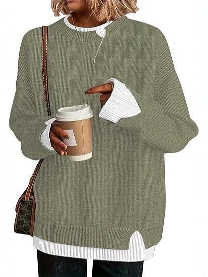 Double-layer crewneck sweater in sage green with white layered cuffs and hem, front view