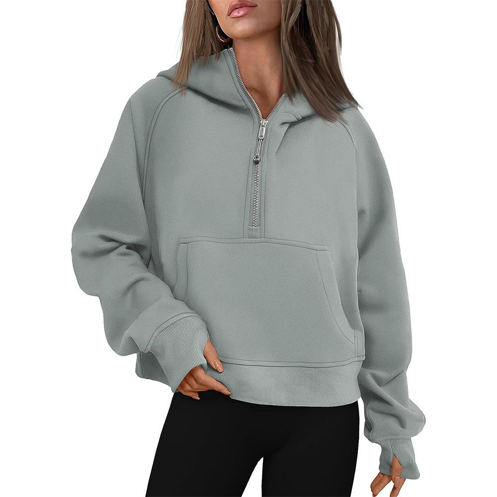 Cropped half-zip hoodie with front pocket and thumbholes in sage gray-green