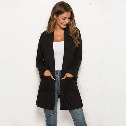 Black longline open-front cardigan with patch pockets, front view