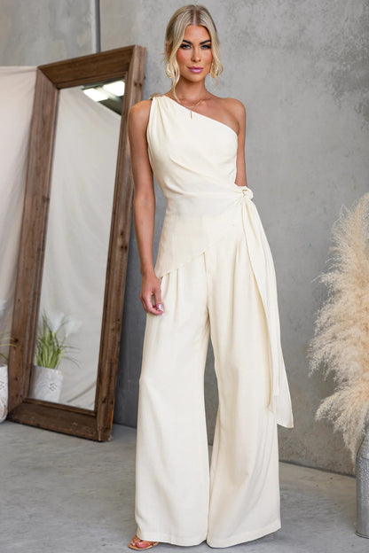 One-shoulder tie-waist top and wide-leg pants set in ivory, front view