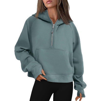 Cropped half-zip hoodie with front pocket and thumbholes in teal blue-gray