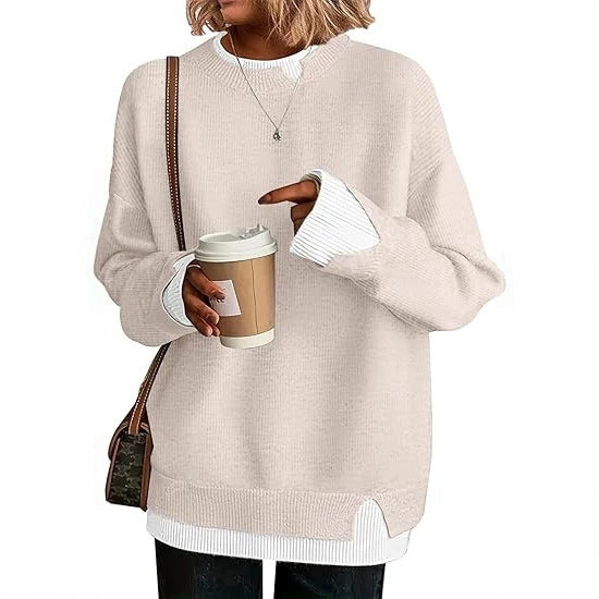Double-layer crewneck sweater in cream with a white layered hem, front view