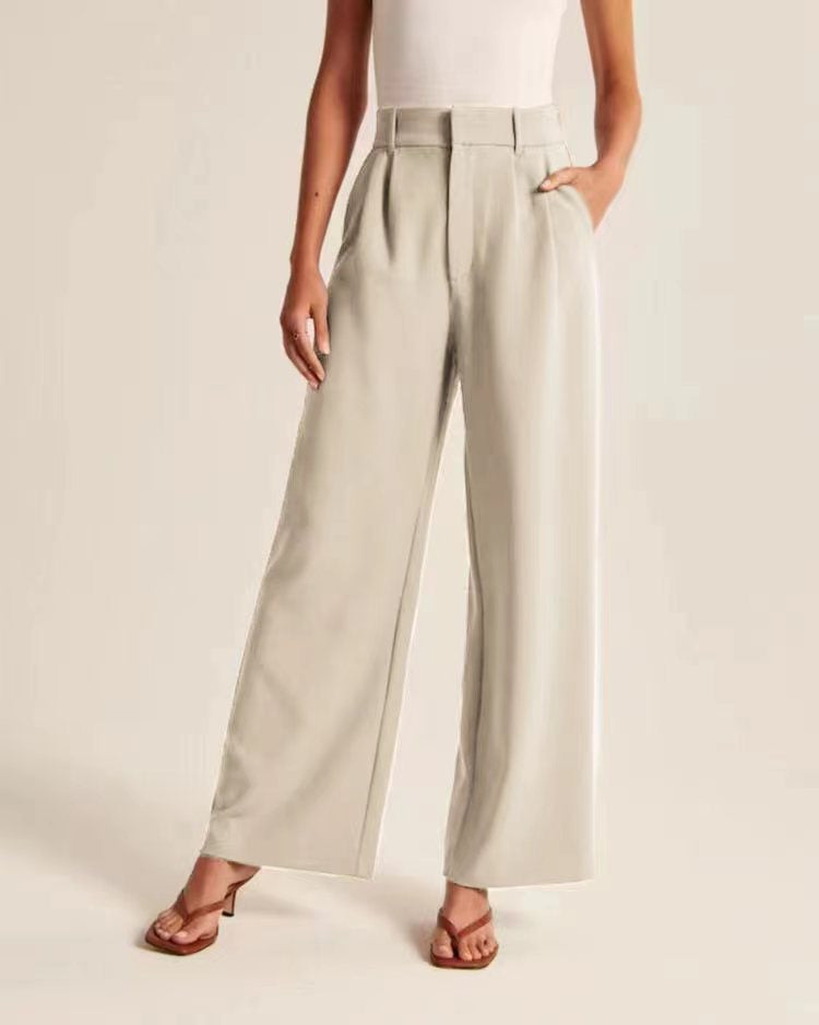 High-waist pleated wide-leg pants in beige, front view