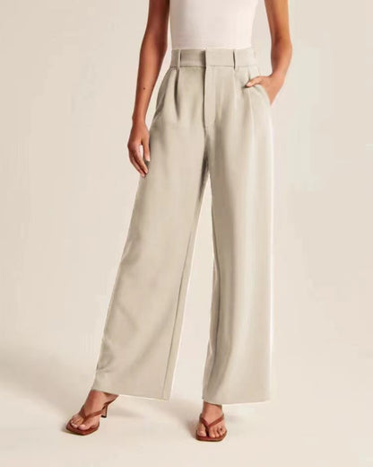 High-waist pleated wide-leg pants in beige, front view