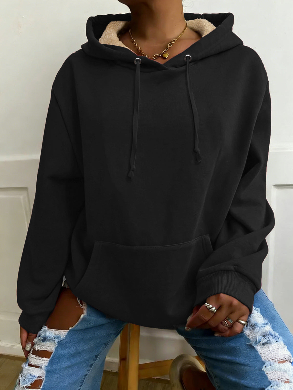 Fleece-lined pullover hoodie with kangaroo pocket in black