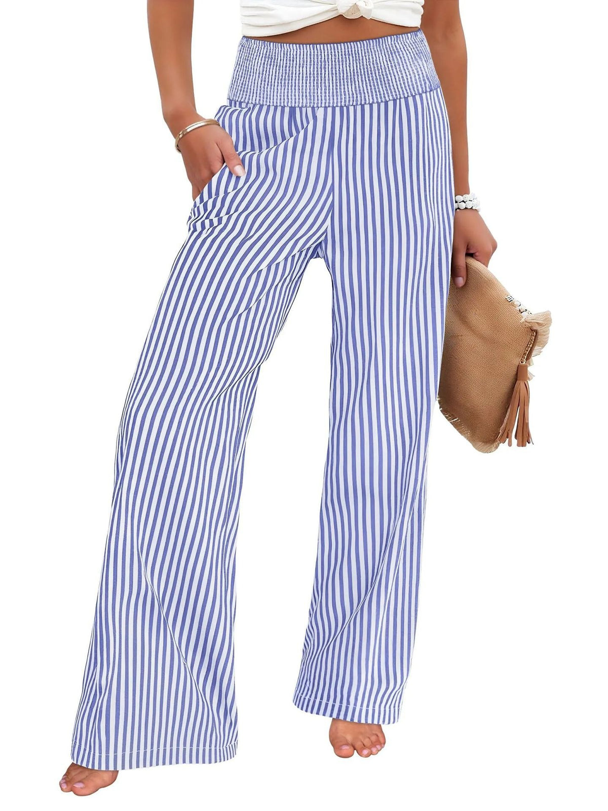 Wide-leg pants in blue and white stripe with a smocked high waist, front view