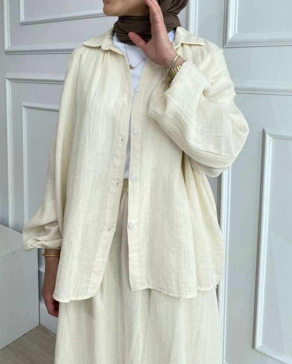 Ivory oversized long-sleeve shirt and long skirt set with gathered cuffs, front view