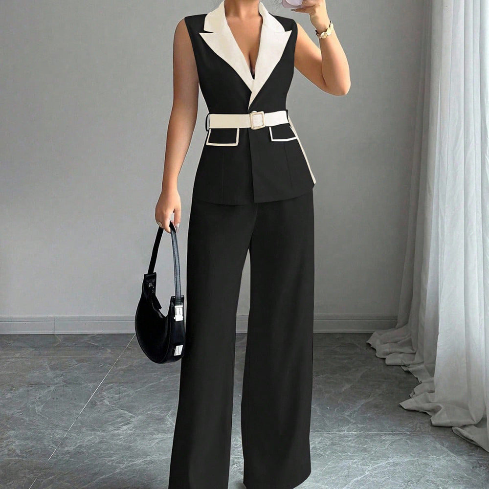 Black sleeveless belted blazer top with white lapel and matching wide-leg pants