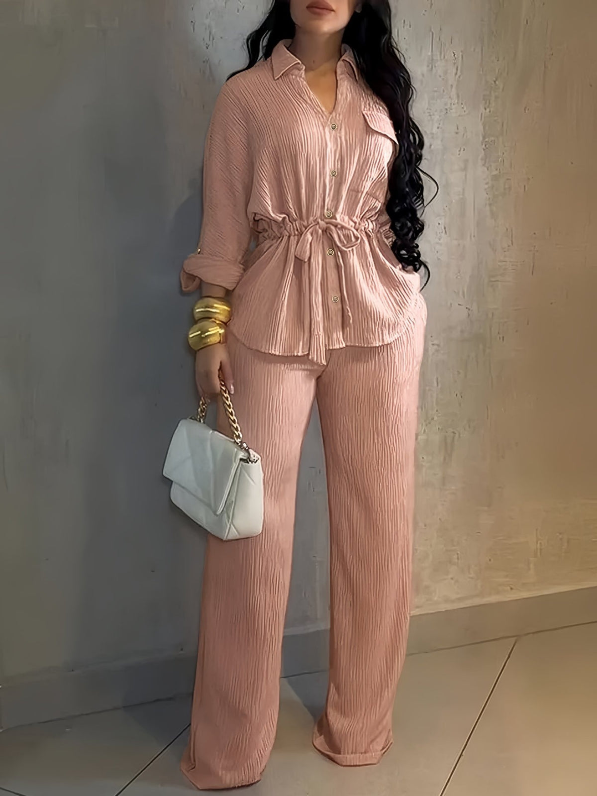 Lapel collar belted shirt and wide-leg pants set in blush pink, front view