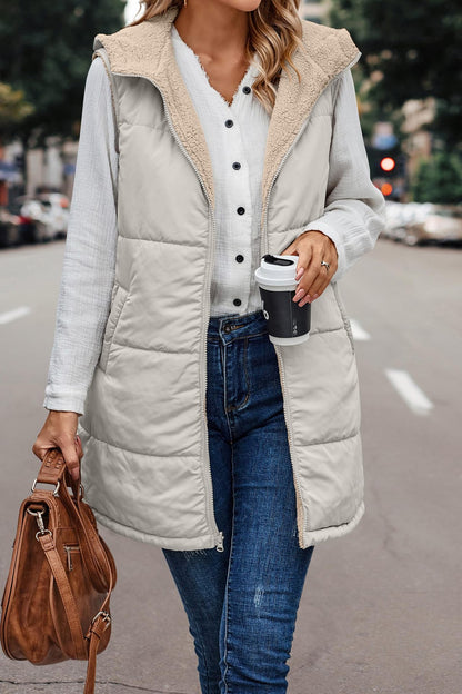 Long quilted hooded vest with soft sherpa lining in light gray