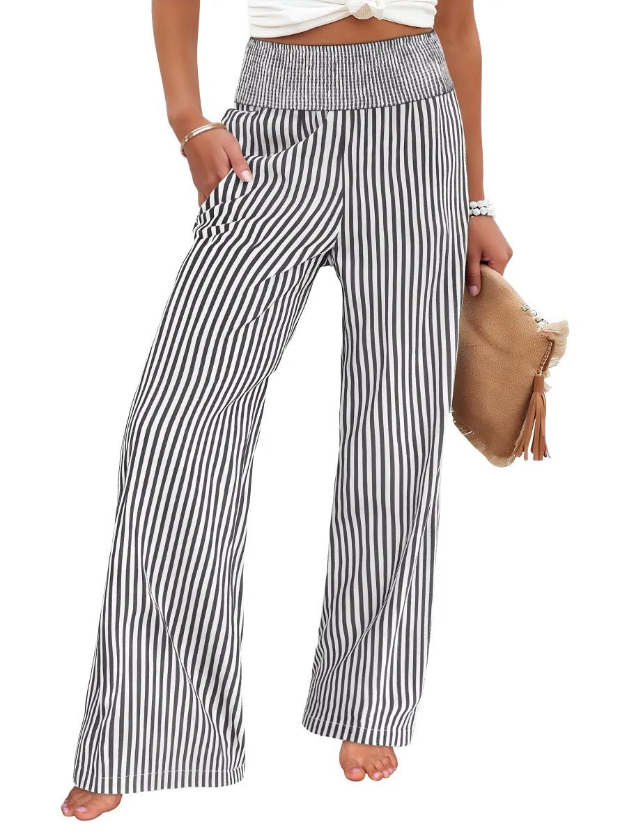 Wide-leg pants in charcoal and white stripe with a smocked high waist, front view