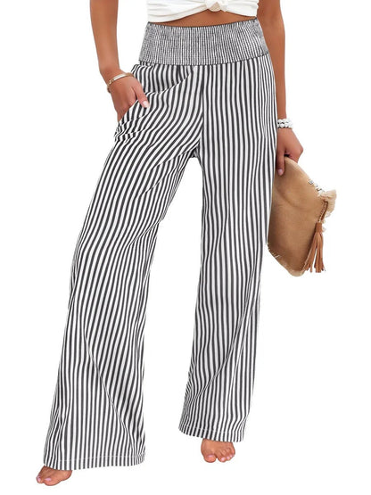 Wide-leg pants in charcoal and white stripe with a smocked high waist, front view