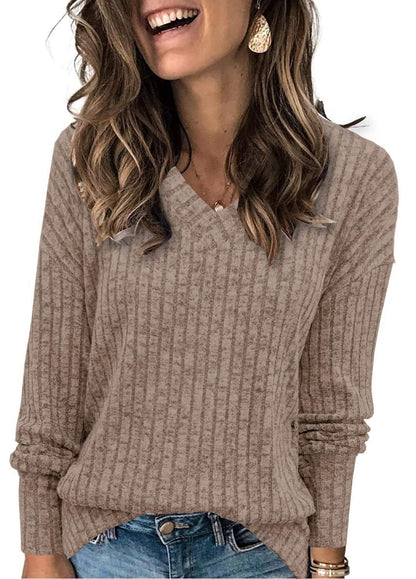 Ribbed V-neck long-sleeve top in latte, worn with jeans