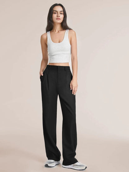 High-waist pleated wide-leg pants in black, front view