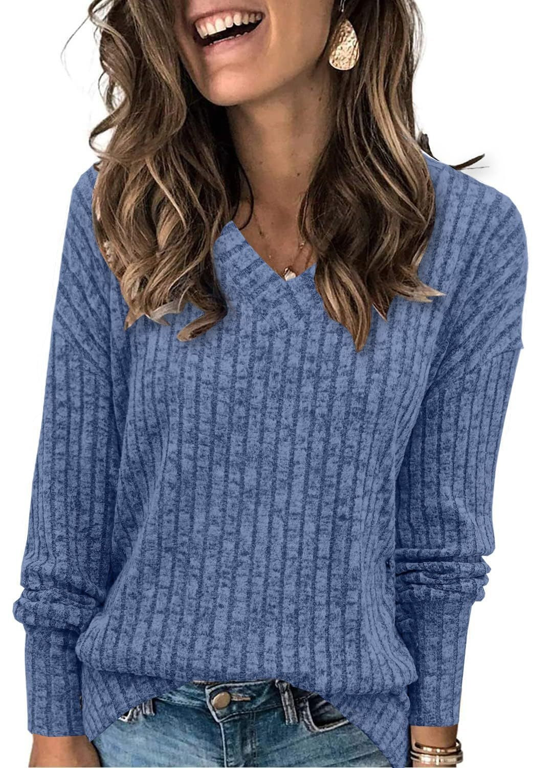 Ribbed V-neck long-sleeve top in cornflower blue, worn with jeans