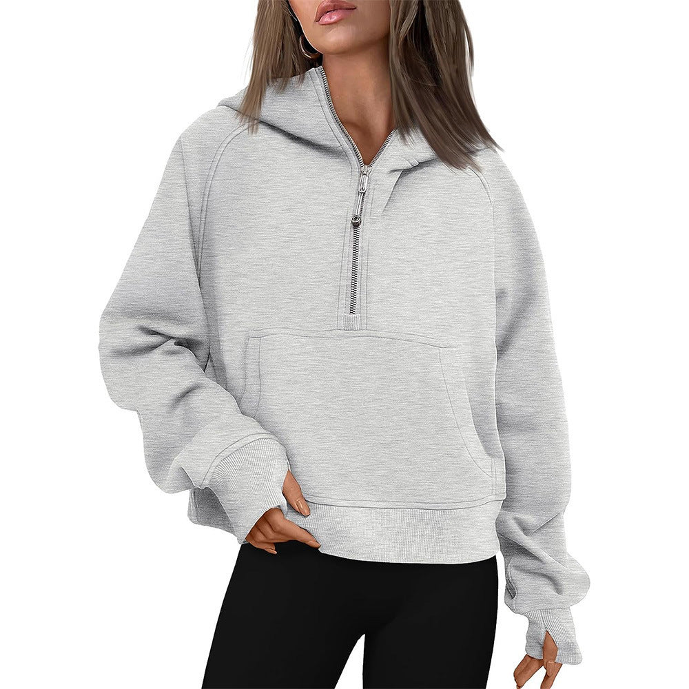Cropped half-zip hoodie with front pocket and thumbholes in heather gray
