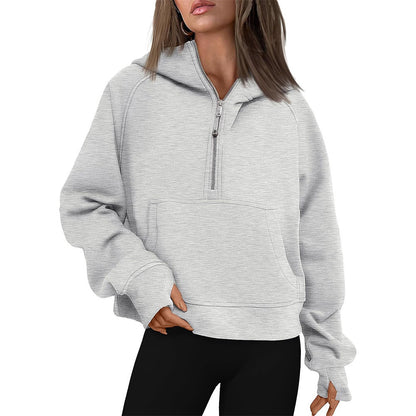 Cropped half-zip hoodie with front pocket and thumbholes in heather gray