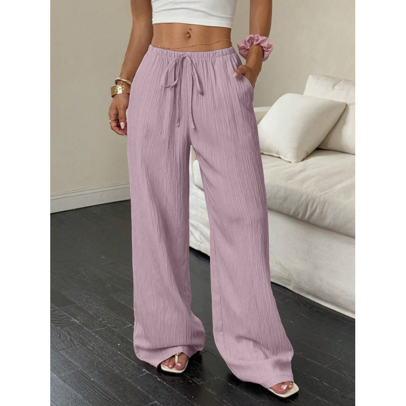 Drawstring wide-leg pants with a textured finish in lilac, front view