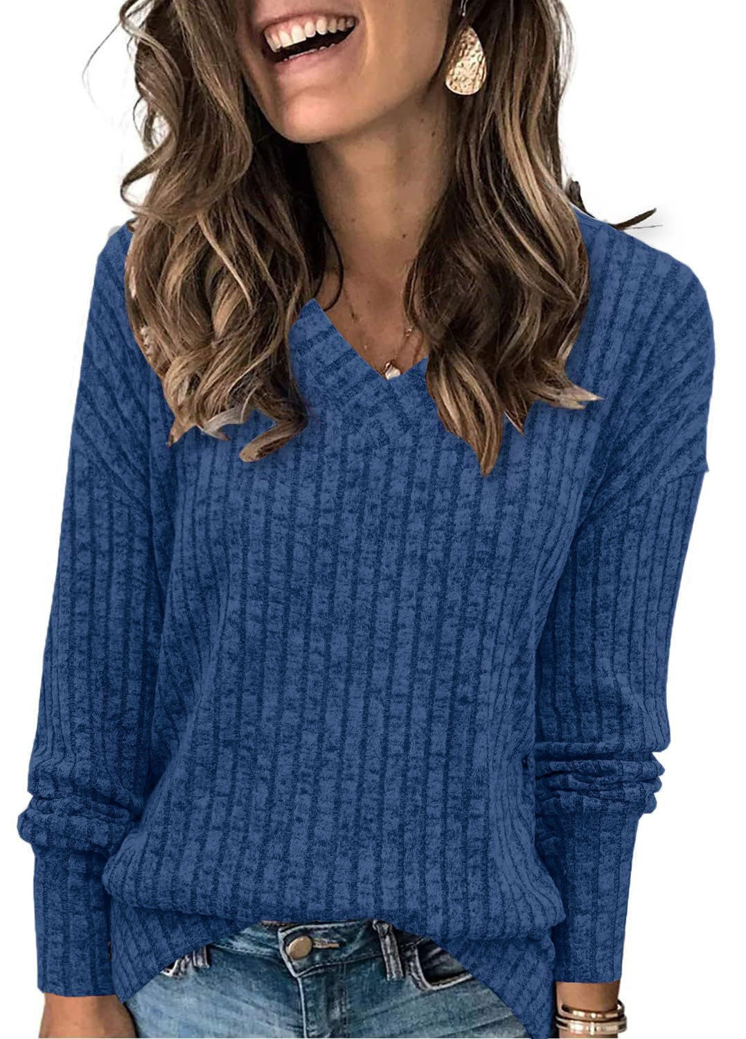 Ribbed V-neck long-sleeve top in royal blue, worn with jeans