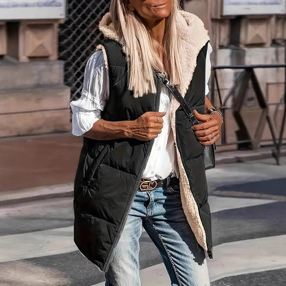 Black long quilted hooded vest with sherpa lining, front view