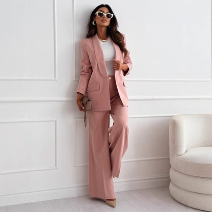 Dusty pink blazer and wide-leg pants set worn with a white top