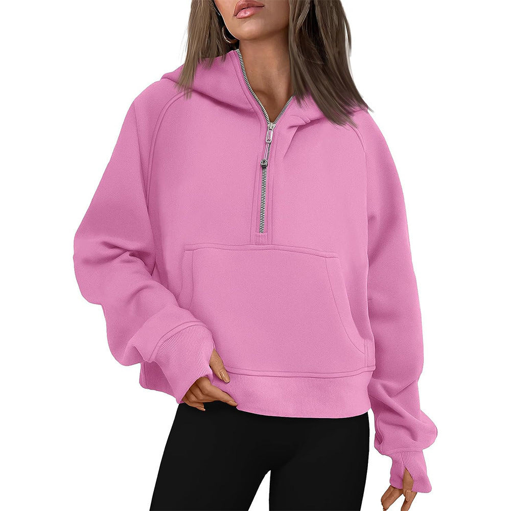 Cropped half-zip hoodie with front pocket and thumbholes in pink
