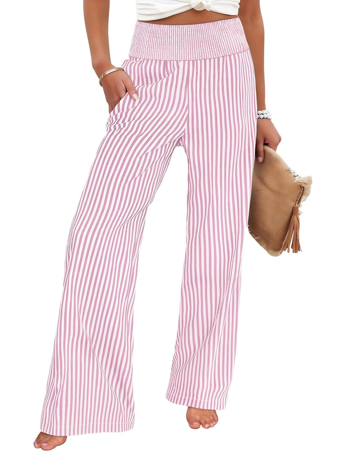 Wide-leg pants in pink and white stripe with a smocked high waist, front view