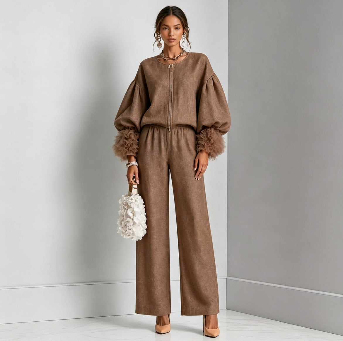 Mocha brown zip-front balloon sleeve top with feather-trim cuffs and wide-leg pants