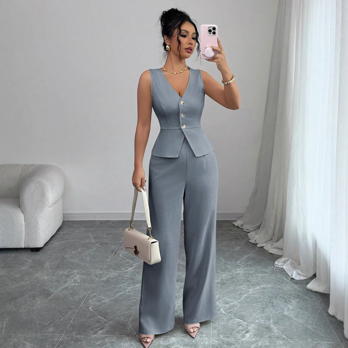 Open sleeveless button-front vest top and wide-leg pants set in slate gray-blue, front view