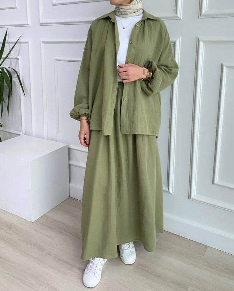 Olive green shirt and long skirt set, full-length front view with white sneakers
