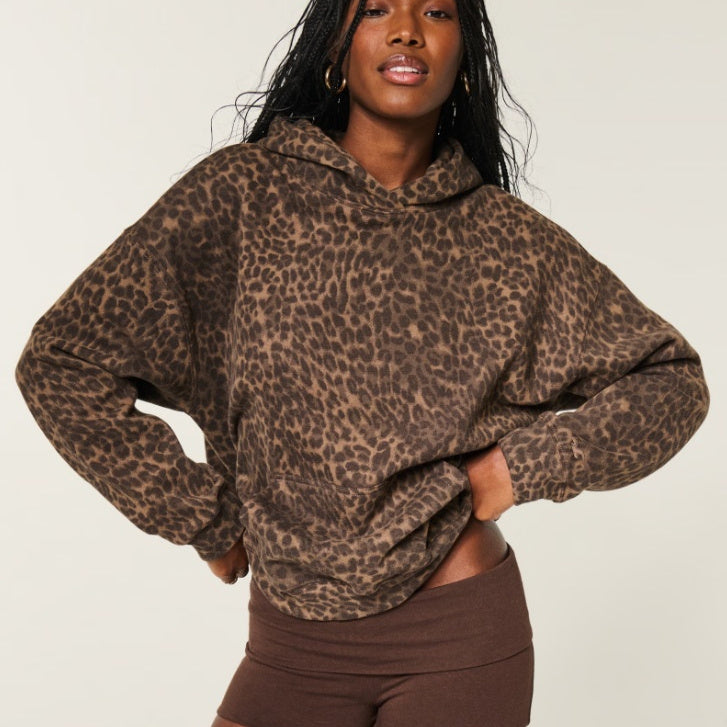 Leopard print oversized pullover hoodie, front view on model