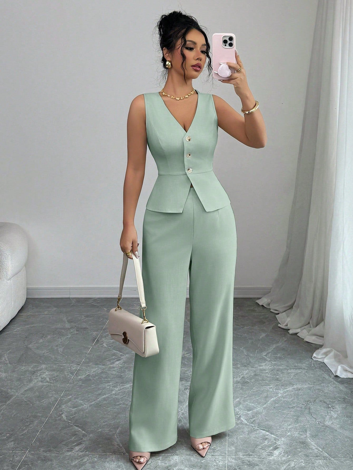 Open sleeveless button-front vest top and wide-leg pants set in sage green, front view